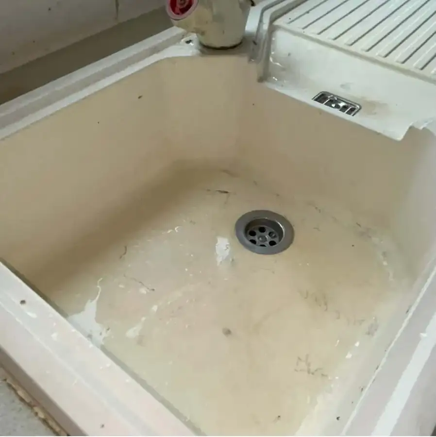Kitchen sink before cleaning