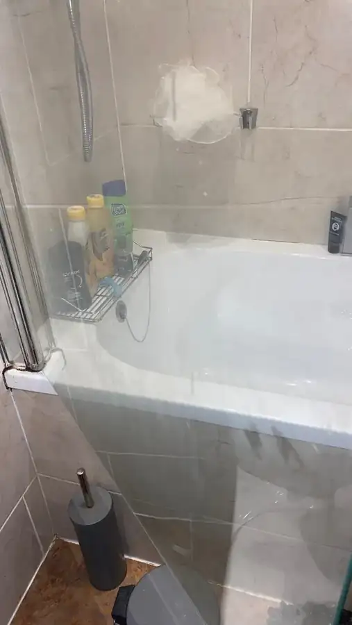 Bath and shower screen before cleaning
