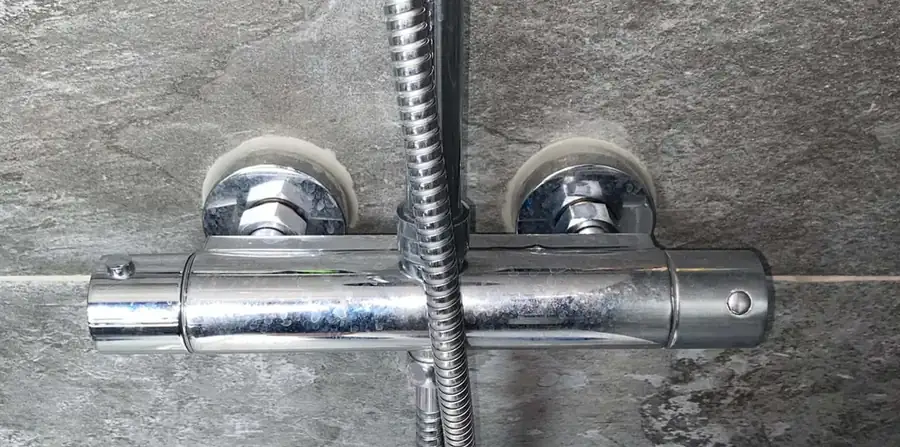 Shower valve limescale before cleaning